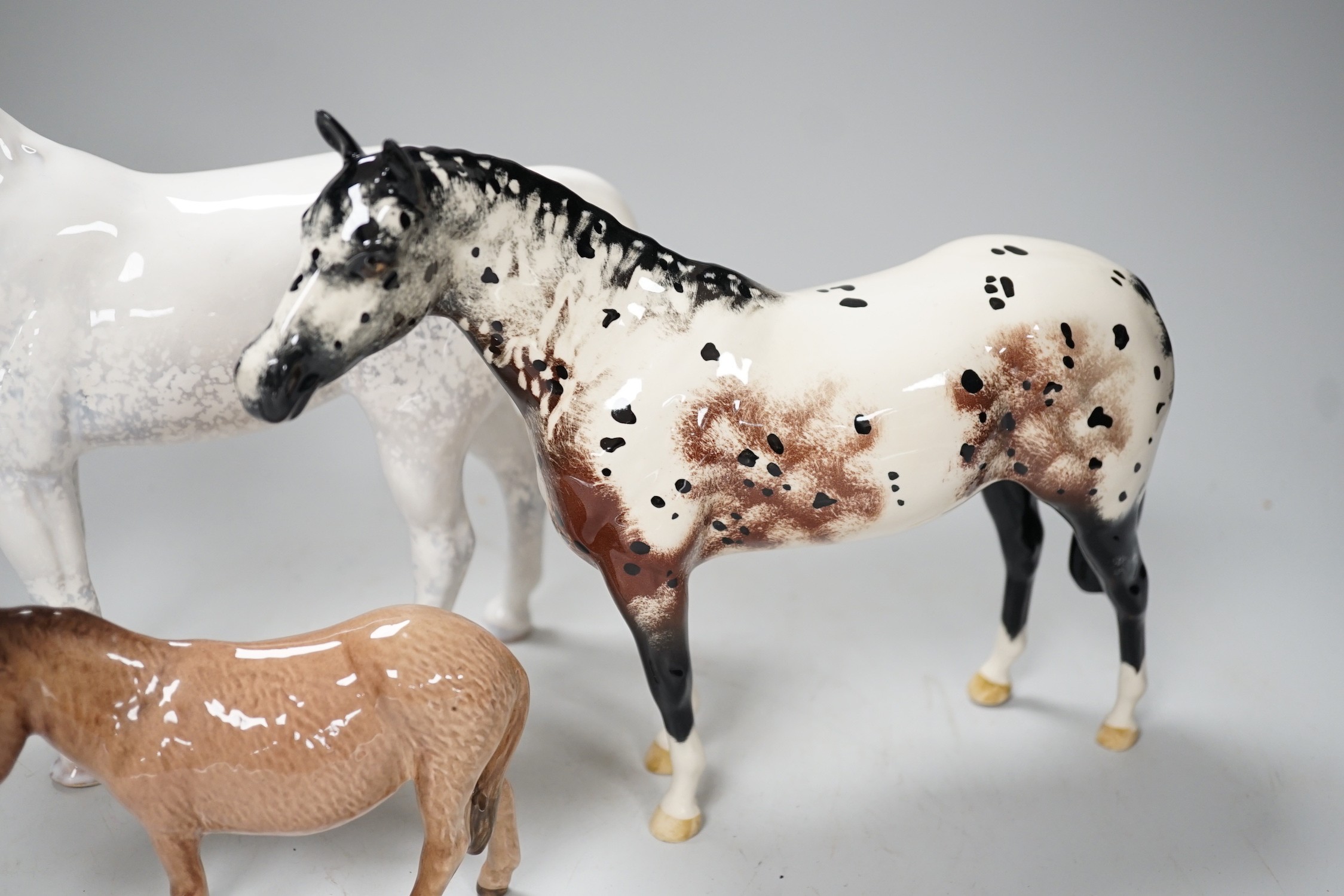 Three ceramic horse models, to include Beswick, Doulton, Sylvac, tallest 23cm